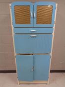 A mid 20th century kitchen cabinet