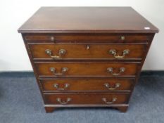 A mahogany chest of four drawers