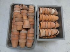 Three crates of terracotta plant pots
