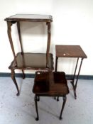 A beech occasional table with tooled leather inset top and three further occasional tables