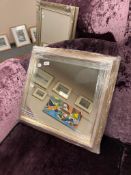 A plain golden framed contemporary mirror 60 cm x 55 cm