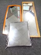 A 1970's teak framed mirror and two further mirrors