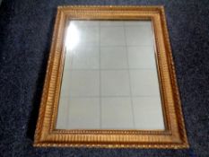 A gilt and gesso framed mirror