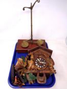 A tray of wooden cuckoo clock and set of brass scales