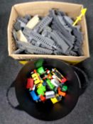 A box of Thomas the Tank Engine trains and track