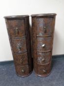 A pair of contemporary cylindrical four drawer chests
