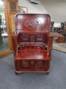 A Chinese hardwood cocktail cabinet/bar