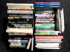 Two boxes of books relating to military vehicles and warfare