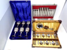 Two canteens of stainless steel cutlery and a further boxed set of six goblets