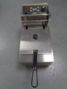 A Buffalo stainless steel commercial fryer