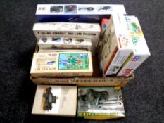 A box of approximately 10 mostly 1:35 scale military and other modelling kits including Tamiya etc