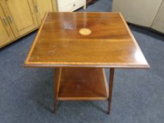 A 19th century inlaid mahogany two-tier occasional table
