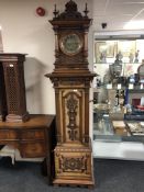 A 19th Century German Oak and Burr Walnut Symphonion or Polyphon Disc Player/Clock,