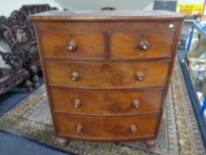 A Victorian mahogany bowfront five drawer chest