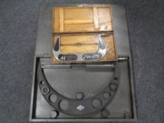 Two boxed micrometers