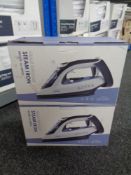 Two boxed Simbr steam irons