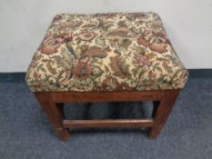 An antique pine tapestry footstool