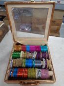 A case of a quantity of bangles