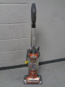 A Shark upright vacuum cleaner