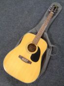 A Royal acoustic guitar in soft carry case