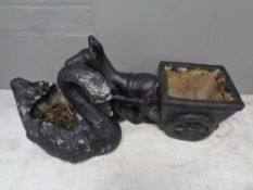 Two painted concrete planters : swan and donkey with cart