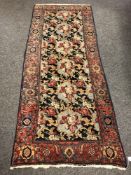 A Persian runner with Abusson central field 94 cm x 234 cm
