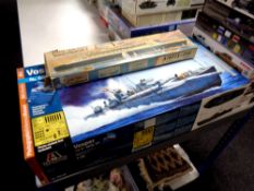 An Airfix 600 scale Queen Elizabeth II model kit together with a Italeri 1:35 scale Vosper MTB 77