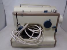 A Frister Rossmann sewing machine with pedal