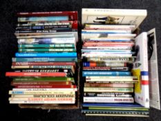 Two boxes of books relating to military vehicles and warfare