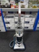 A Hoover upright vacuum cleaner