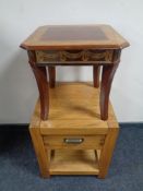 An oak two tier lamp table and an occasional table