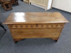 A 19th century oak coffer,