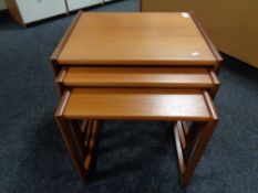 A nest of three 20th century teak G-Plan tables