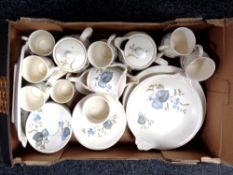 A box containing Sylvac dinner and coffee ware.