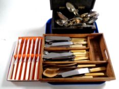 A 19th century ebonised table box together with a wooden cutlery caddy containing a quantity of