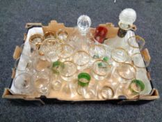 A box of two cut glass ships decanters,