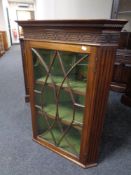 A 19th century mahogany glazed door corner cabinet