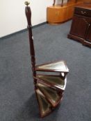 A reproduction set of library steps with green leather panels