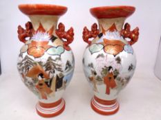 A pair of Japanese Kutani porcelain vases, height 30cm.