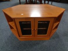 A 20th century teak G-plan corner TV stand / cabinet