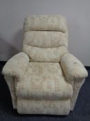 An electric adjustable reclining armchair.