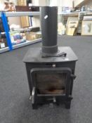 A cast iron multi-fuel stove.