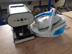 A Delta steam generator iron together with a Next coffee machine