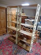 A pair of contemporary open bookshelves