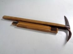 A pickaxe together with a folding rule