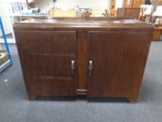 A 20th century double door sideboard
