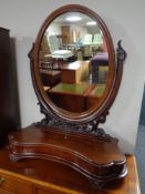 A Victorian mahogany dressing table mirror