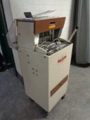 A Kuhn commercial bread slicer