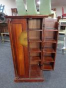 An oriental-style double-door media cabinet.