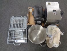 A box of Brevelle fryer, stainless steel bread maker, cased knives,